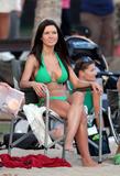 Audrina Patridge shows her big fake breasts in green bikini on The Reef Movie Set in Hawaii